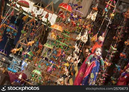 Decorations hanging at a market stall, Pushkar, Rajasthan, India
