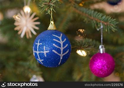 Decorations of christmas three, with mythological characters. Christmas-tree colored balls to decorate the Christmas tree.
