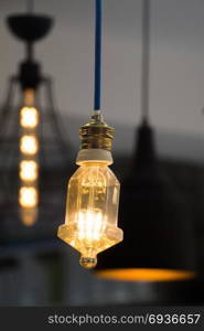 Decorative antique edison style filament light bulbs hanging