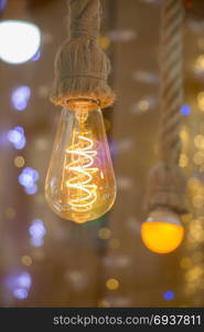 Decorative antique edison style filament light bulbs hanging