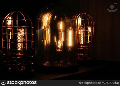 decorative antique tungsten light bulbs in steel cage. antique tungsten light bulbs in steel cage