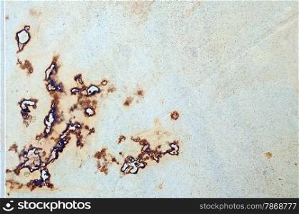 Decorative beige stone background with rusty stains.