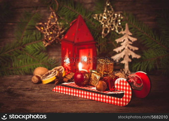 Decorative boxes and nuts on the sledges. Symbols of Christmas holiday