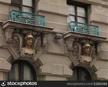 Decorative carvings on exterior of a building in Manhattan, New York City, U.S.A.