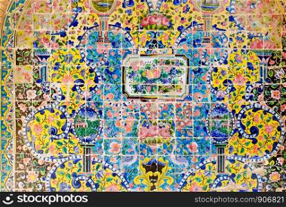 Decorative ceramic tilework on the wall of Golestan palace. Tehran, Iran.