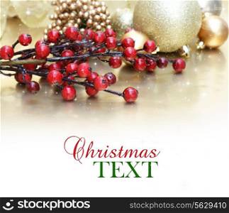 Decorative Christmas background with berries and baubles.