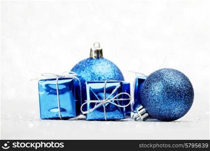 Decorative Christmas balls and gifts on white background. Christmas balls and gifts