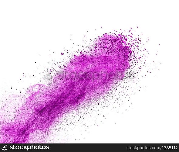 Decorative diagonal powder explosion or splash of purple color on a white background with copy space.. Diagonal creative powder splash in purple colors on a white background.