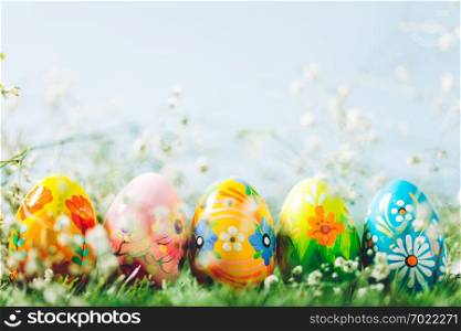 Decorative eggs on green grass. Easter, traditioonal Christian spring holiday. Copyspace.. Decorative eggs on green grass.