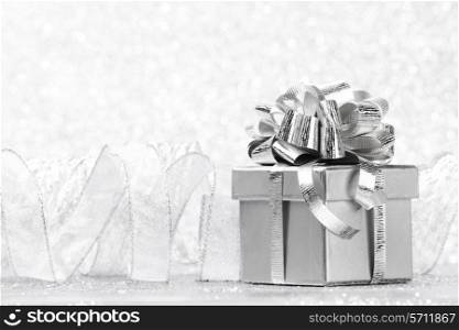 Decorative holiday Gift box on bright shiny background