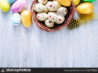 decorative painted Easter eggs on a table, easter background