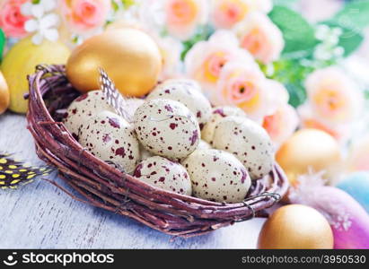 decorative painted Easter eggs on a table, easter background