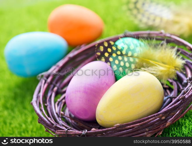 decorative painted Easter eggs on a table, easter background