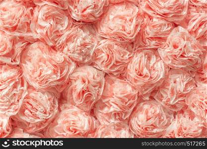 Decorative paper roses from napkins as texture background pattern. Creative festive wall decoration.. Decorative paper roses from napkins as texture background pattern. Creative festive wall decoration