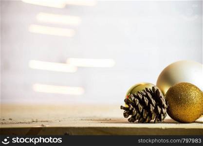 decorative pine cones with gold christmas balls decoration Christmas background texture colorful sparkles design. decorative pine cones with gold christmas balls decoration Christmas background texture