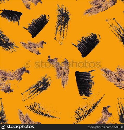 Decorative seamless pattern with black mascara smudges. Texture of mascara black smears and stains on orange background.. Decorative seamless pattern with black mascara smudges.