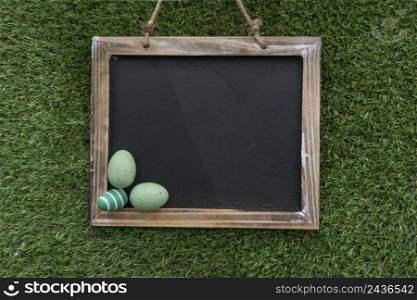 decorative slate with green easter eggs