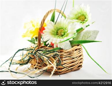 decorative spring flowers in a basket