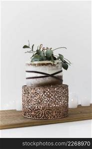 decorative wedding cake with wedding cake wooden table