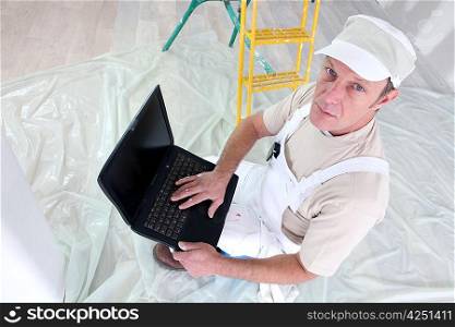 Decorator using laptop