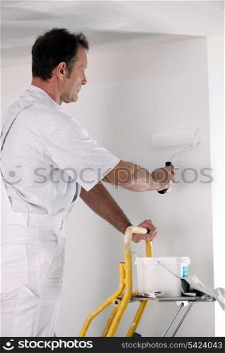 Decorator working on DIY project