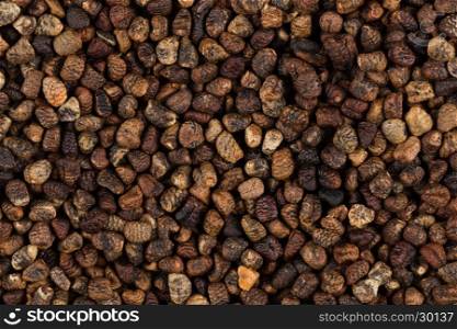 Decorticated cardamom seeds close up image can be used for background