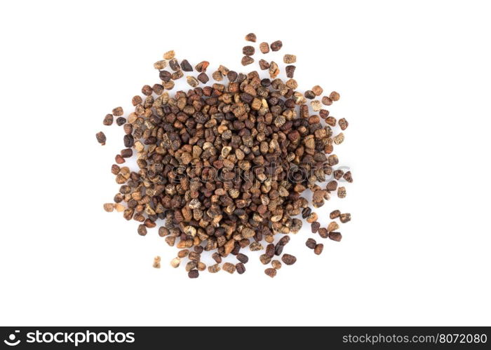 Decorticated cardamom seeds pile on a white background