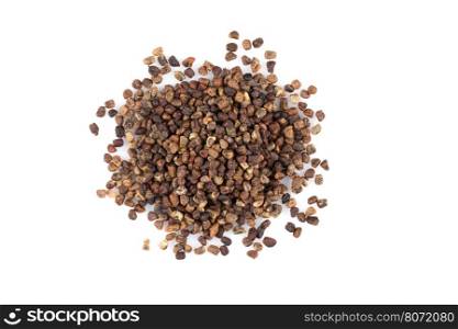 Decorticated cardamom seeds pile on a white background