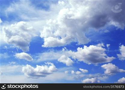 Deep blue cloudy sky background
