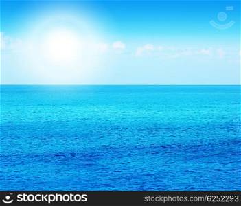 Deep blue sea background, beautiful water of nature, calm beach with sunlight