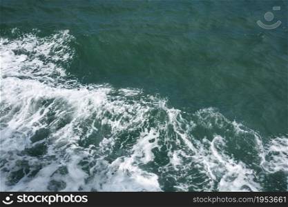 Deep Blue Sea Water Surface With White Foam And Waves Pattern, Background Photo Texture