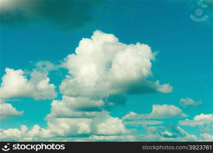 Deep blue sky background with withe clouds. Natural composition of nature.