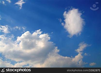deep blue sky with clouds and sun rays background
