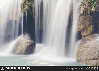 Deep forest Waterfall in Kanchanaburi, Thailand. Waterfalls shallow water