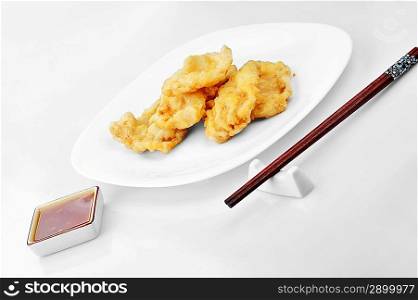 deep fried chicken with red sauce. chinese cuisine