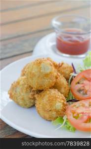 Deep Fried Potato Croquettes served with tomato sauce&#xA; and fresh vegetable