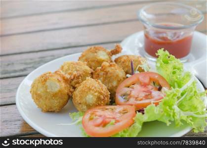 Deep Fried Potato Croquettes served with tomato sauce&#xA; and fresh vegetable