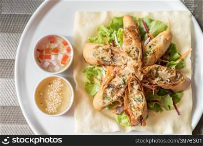 Deep fried Spring roll in white plate Thai food