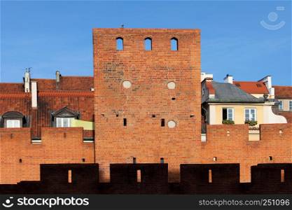Defensive brick wall and tower, part of the Old Town fortifications in Warsaw, Poland.