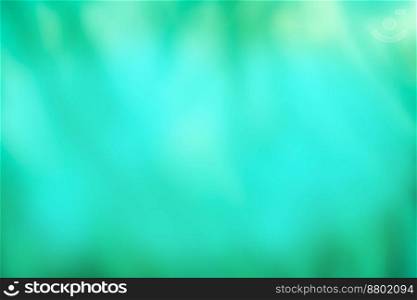 Defocused aqua color background. Green jade blurred background with sun bokeh.. Spring green turquoise blurry bokeh backdrop. Mint color bokeh