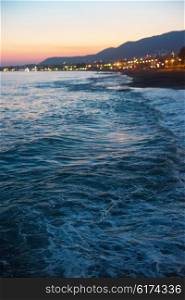 Defocused background of blue sea with waves in the evening. sea in the evening