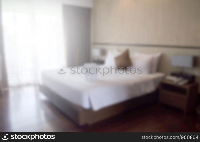 defocused blur bedroom interior for background.