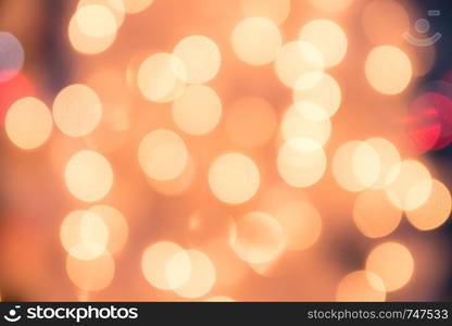 Defocused bokeh light background for Christmas and New Year Celebration