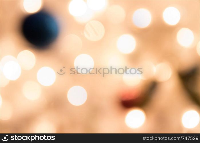Defocused bokeh light background with decoration for Christmas and New Year Celebration
