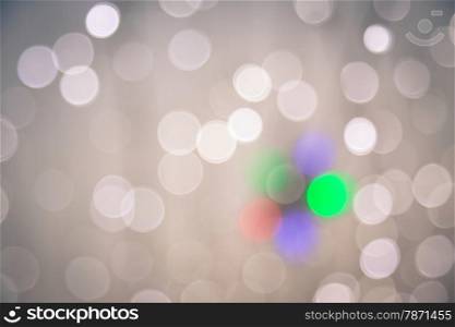 Defocused bokeh lights, abstract background with vignette