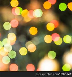Defocused Christmas tree lights as a holiday background