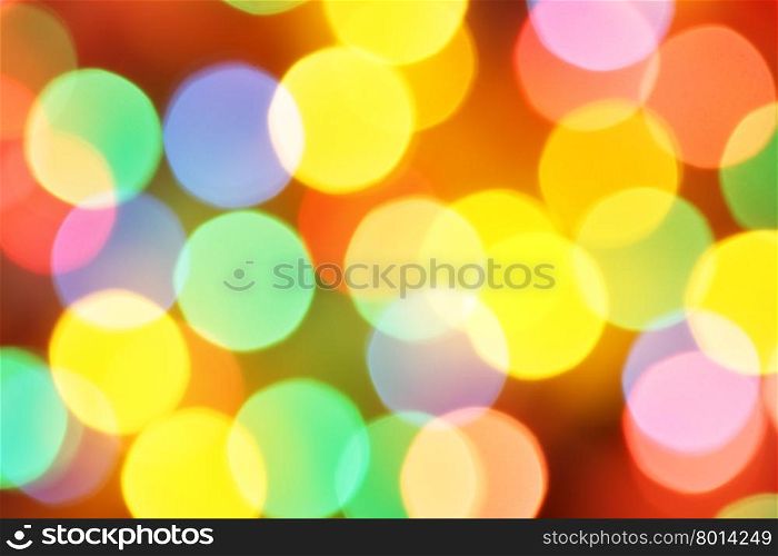 Defocused colorful holiday lights, may be used as background