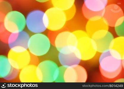 Defocused colorful holiday lights, may be used as background