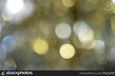 Defocused golden light spots as abstract background