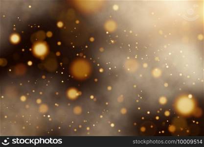 Defocused golden yellow lights or bokeh on black background. Holiday background. Defocused golden yellow lights or bokeh on black background.